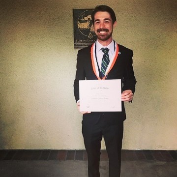 Brandon Lippincott receiving a DeMolay International award